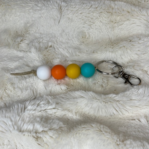 Handmade 15mm silicone bead keychain or zipper pull. Teal/yellow/orange/white. - Picture 1 of 3